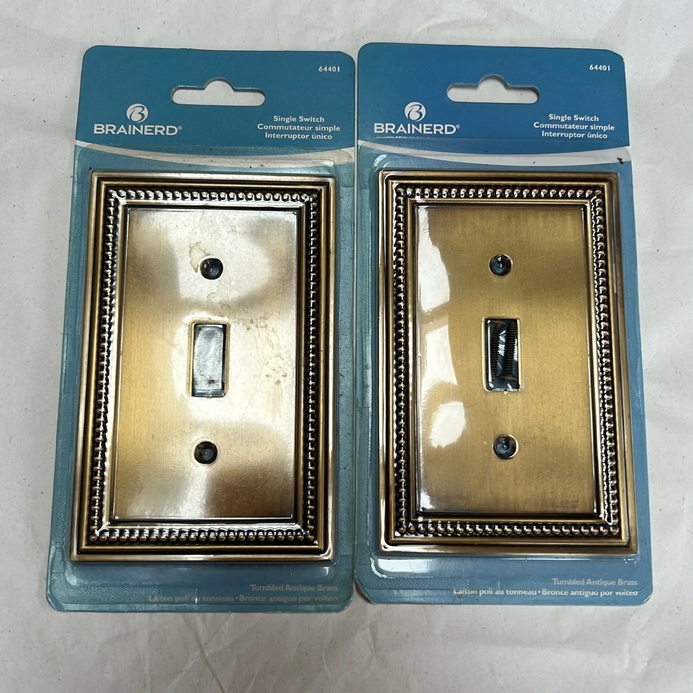 2 Brainerd tumbled antique brass light Switch covers